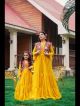 Yellow Color Embroidery Work Mother Daughter Ruffle Gown